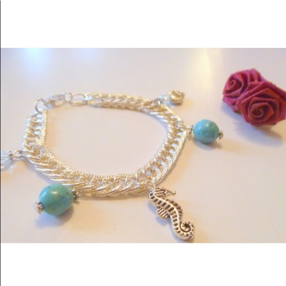 Chainmaille bracelet with sea horse charms